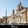 La Fuente de los Cuatro Ríos frente a la iglesia de Santa Inés en Agonía en la Piazza Navona, con un texto debajo que dice “National Geographic Day Tours”